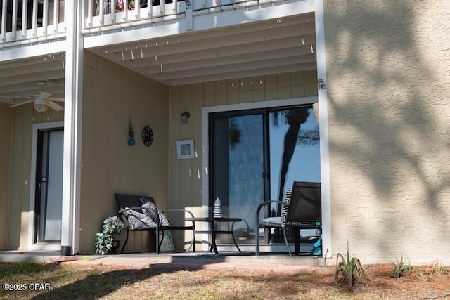 view of patio / terrace featuring a balcony and a ceiling fan