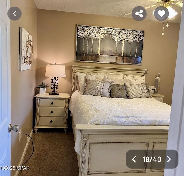 bedroom with dark colored carpet