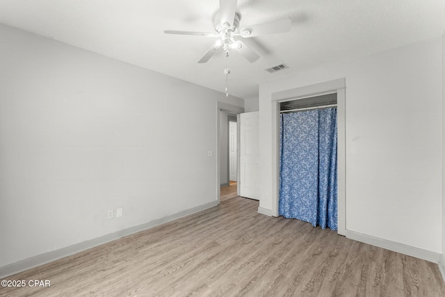 7577 Kelsey Dr, Panama City, FL 32404 - empty room with baseboards, visible vents, ceiling fan, and wood finished floors