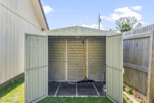 7577 Kelsey Dr, Panama City, FL 32404 - view of outbuilding featuring fence