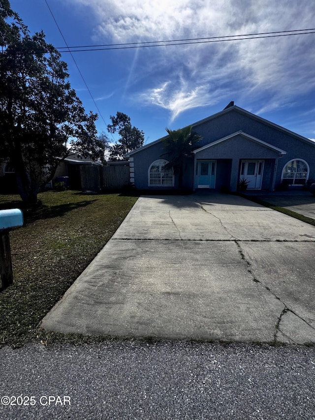 view of front of home featuring driveway