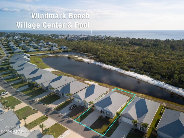 aerial view with a water view and a residential view