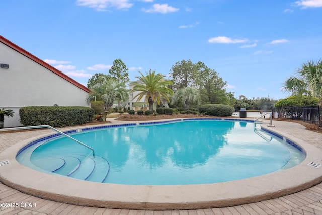 8730 Thomas Dr Unit 1201-B, Panama City Beach, FL 32408 - pool featuring fence