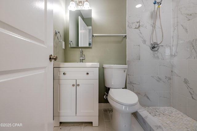 1705 Lake Ave, Panama City, FL 32401 - full bath with a tile shower, vanity, marble finish flooring, and toilet