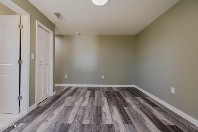 1705 Lake Ave, Panama City, FL 32401 - empty room with wood finished floors and baseboards