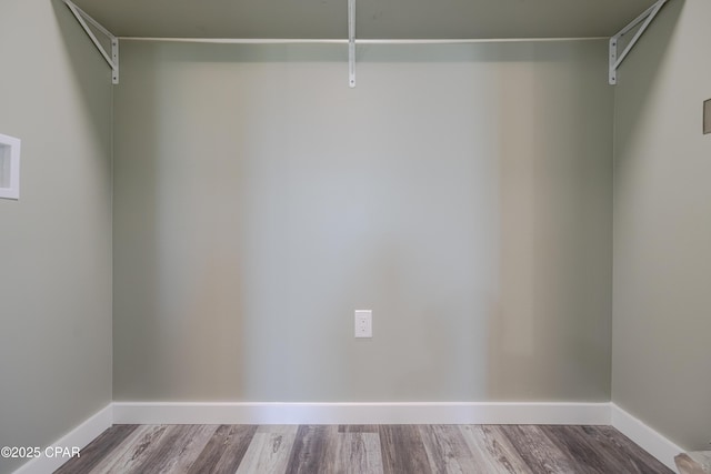 1705 Lake Ave, Panama City, FL 32401 - walk in closet with wood finished floors