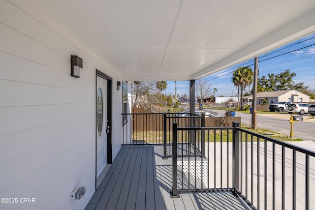 1705 Lake Ave, Panama City, FL 32401 - wooden terrace with a residential view and a porch