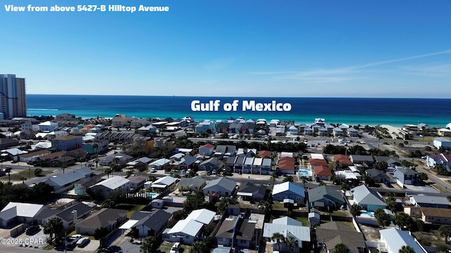 aerial view with a water view and a residential view