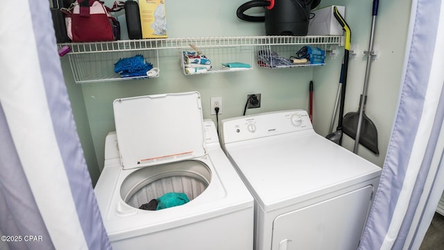 laundry area with laundry area and washer and dryer