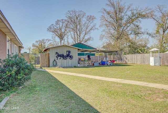 view of yard featuring an outbuilding and a fenced backyard