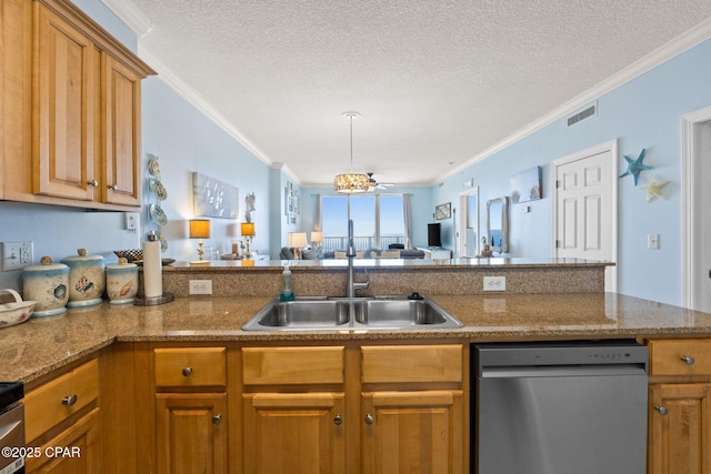 kitchen with dishwasher, brown cabinets, open floor plan, and a sink