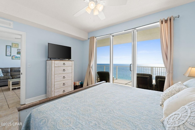 tiled bedroom featuring access to exterior, baseboards, visible vents, and ceiling fan