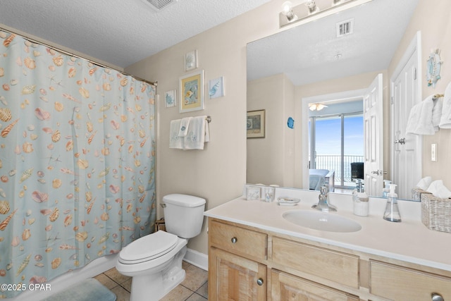 ensuite bathroom with visible vents, connected bathroom, toilet, tile patterned floors, and a textured ceiling