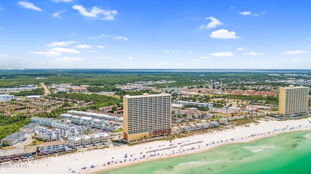 drone / aerial view with a beach view and a water view