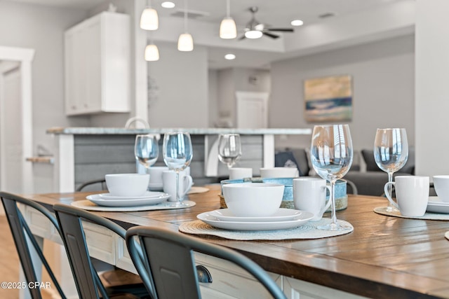 dining room featuring recessed lighting