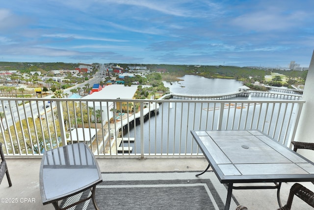 balcony featuring a water view