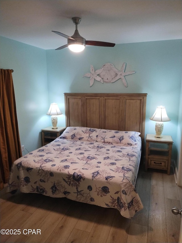 bedroom featuring ceiling fan and light wood finished floors