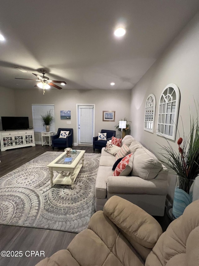 living area with wood finished floors, a ceiling fan, and recessed lighting