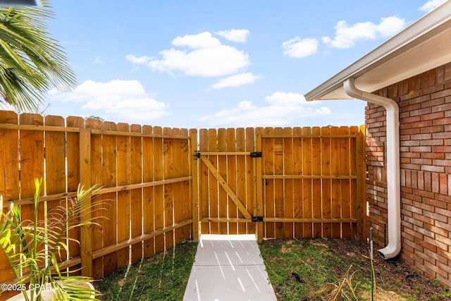 view of yard featuring a gate and fence