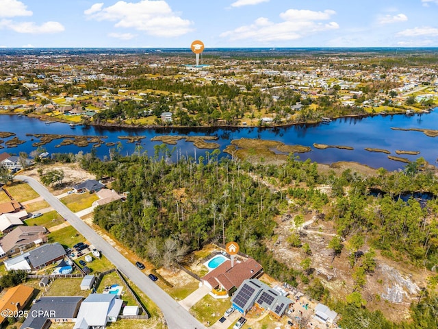 birds eye view of property with a residential view and a water view