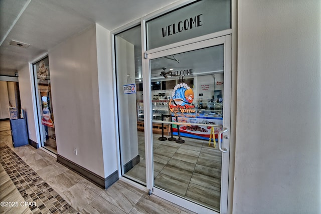 doorway to property with visible vents