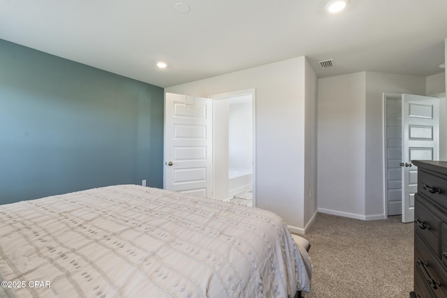 carpeted bedroom with visible vents, baseboards, and recessed lighting