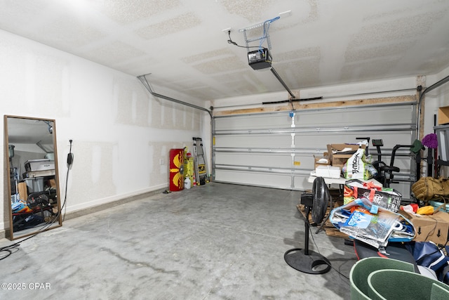 garage featuring a garage door opener