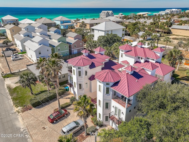 birds eye view of property with a residential view and a water view