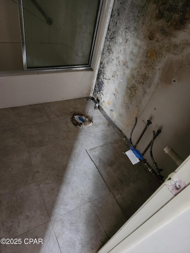 full bathroom featuring combined bath / shower with glass door