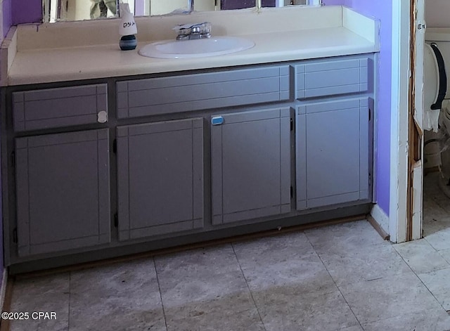 bathroom with vanity and tile patterned floors