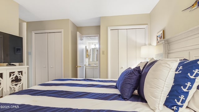 bedroom with multiple closets