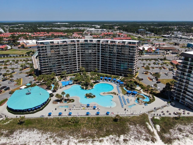 birds eye view of property featuring a city view