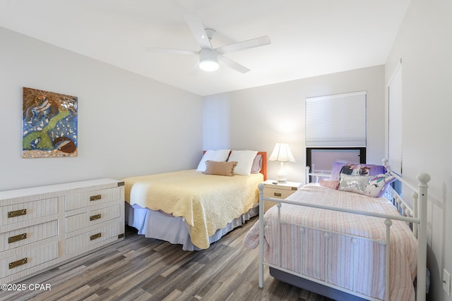 bedroom featuring ceiling fan and wood finished floors