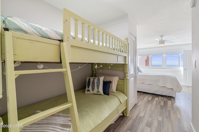 bedroom featuring wood finished floors