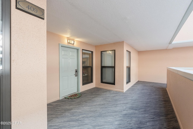 property entrance featuring a balcony