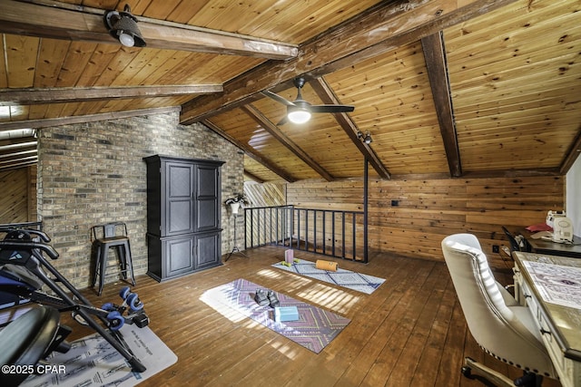 interior space featuring wood ceiling, dark wood-style flooring, and vaulted ceiling with beams