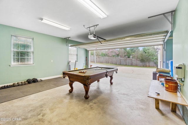 recreation room featuring a garage, baseboards, concrete flooring, and pool table