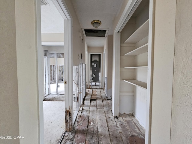 hallway with a textured wall