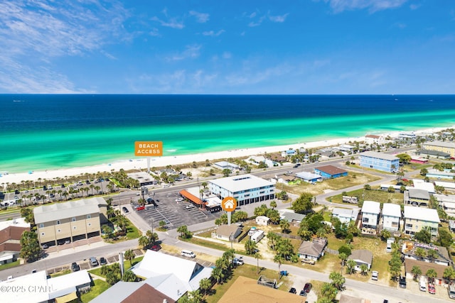 aerial view featuring a water view and a view of the beach