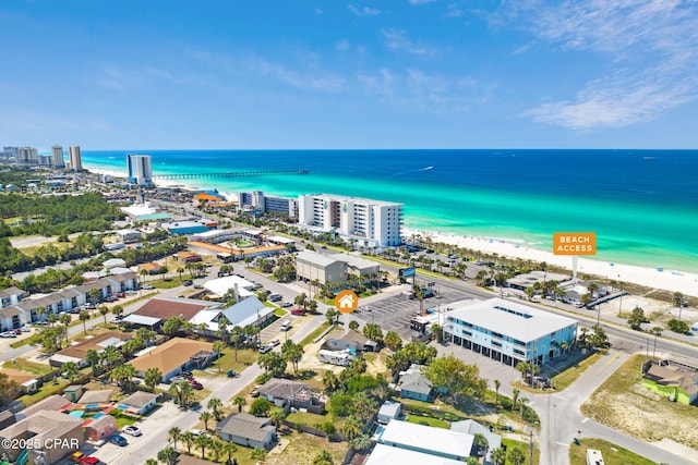 bird's eye view with a beach view and a water view