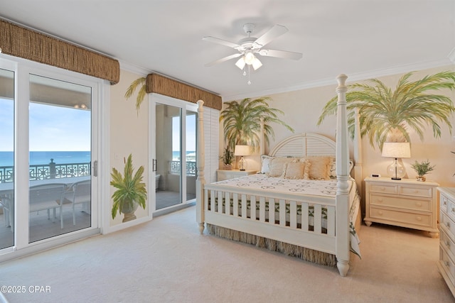 bedroom with access to exterior, light colored carpet, ornamental molding, and ceiling fan