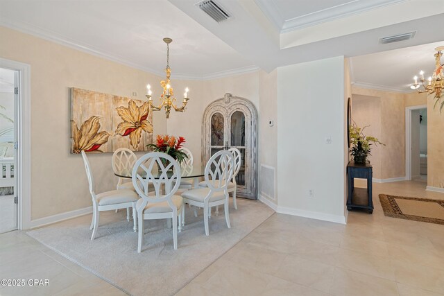 tiled dining space with visible vents, crown molding, baseboards, and an inviting chandelier