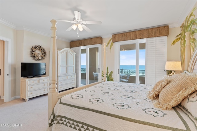 bedroom featuring light carpet, a water view, a ceiling fan, access to exterior, and crown molding