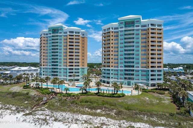 view of property with a community pool