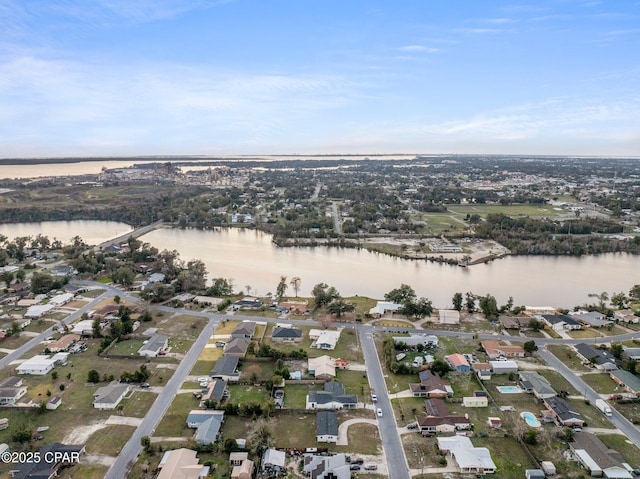 aerial view with a water view and a residential view