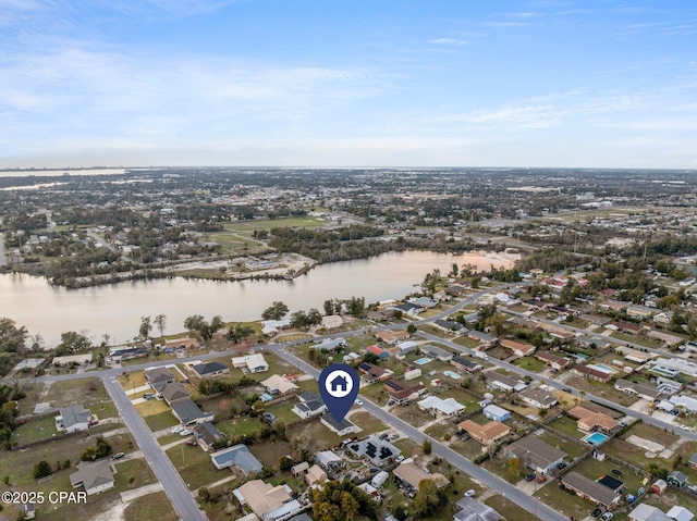 birds eye view of property featuring a water view and a residential view