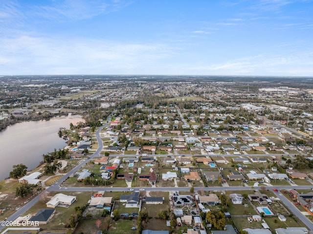 bird's eye view with a water view and a residential view