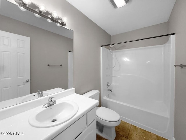 full bath featuring tile patterned flooring, toilet, visible vents, vanity, and tub / shower combination