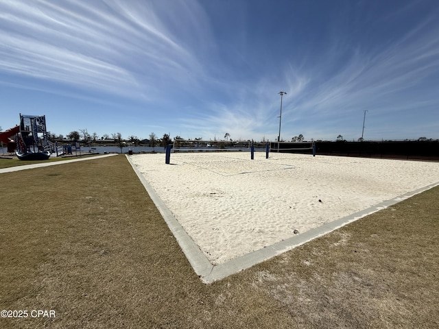 view of home's community featuring volleyball court