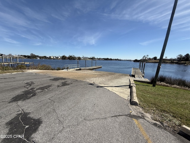 dock area featuring a water view
